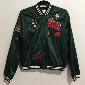 Patched bomber jacket